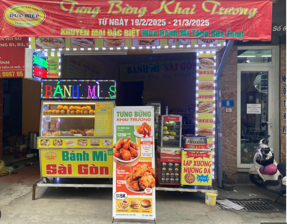 Standee Khai Trương Nên Thiết Kế Như Thế Nào? - mẫu thực tế